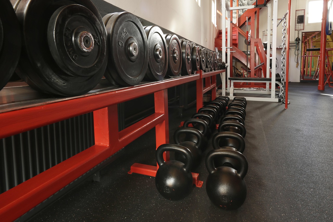 Resistance Bands vs. Weights: Which is Better for At-Home Muscle Building?